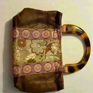 Meta handbag, brown with floral print​